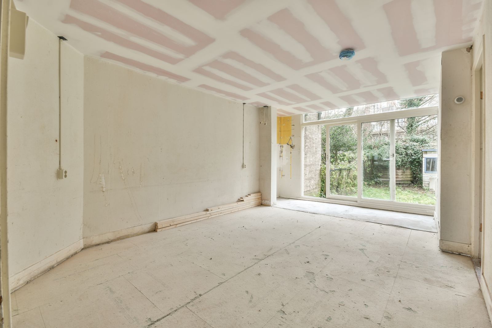 Bright room with wood flooring